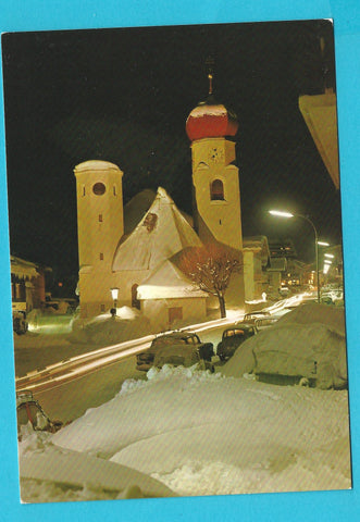 AK St. Anton. Pfarrkirche bei Nacht.