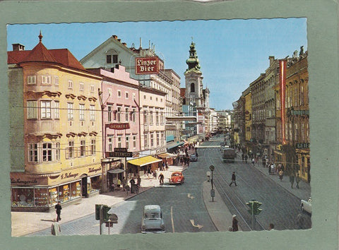 AK Linz, Donaustadt am Alpenrand. Landstraße vom Taubenmarkt aus gesehen.